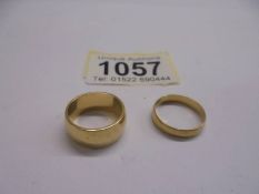Two 18ct gold wedding rings, sizes I and J half, 9.3 grams.