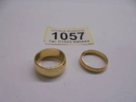 Two 18ct gold wedding rings, sizes I and J half, 9.3 grams.