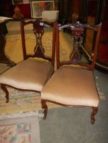 A pair of Edwardian mahogany nursing chairs, COLLECT ONLY.