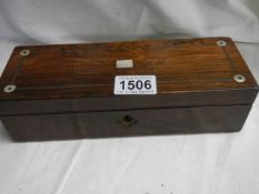 An early 20th century rosewood glove box.