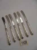 A set of six silver handled butter knives, I S G Sheffield.