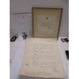 An MBE certificate of Major Joseph Morris Hall signed by Queen Elizabeth II and Prince Phillip