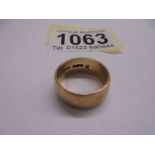 A 9ct gold wedding ring, size K, 5.4 grams.