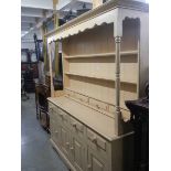 An early painted four door pine dresser. COLLECT ONLY.
