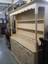 An early painted four door pine dresser. COLLECT ONLY.