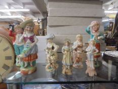 Seven assorted porcelain figures, one a/f.