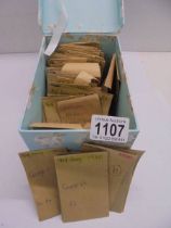 A quantity of pre-decimal copper half pennies in envelopes.