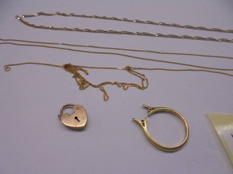 Three 9ct gold chains, a 9ct gold padlock (4.32 grams) and an a/f 18ct gold ring, (1.8 grams). - Image 2 of 2