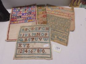 Five various 19th century samplers.