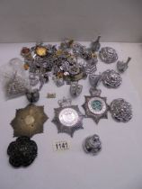 A good lot of police badges, buttons, numbers etc.,