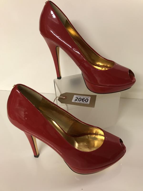 Red patent Ted Baker peep toe heels. With lovely gold colour inside and underneath.