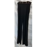 A Pair of Sheer Gucci evening trousers with side zip, Size 42, inside seam length 32"