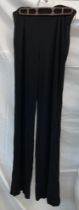 A Pair of Sheer Gucci evening trousers with side zip, Size 42, inside seam length 32"