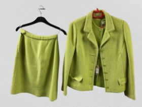 A vintage lime green 3 piece set. Jacket, top & skirt