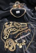 A collection of black & gold costume jewellery