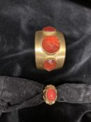 A selection of costume jewellery in various red tones
