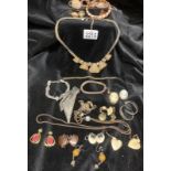 A good collection of clip-on earrings and other costume jewellery including white metal
