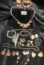 A good collection of clip-on earrings and other costume jewellery including white metal