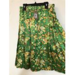 A Vintage 1970's handmade pure silk skirt. Bright green with floral print