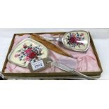 A decorative dressing tables set with flower backed design
