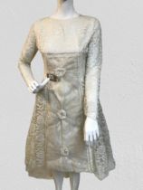An original true vintage wedding dress circa 1960's,