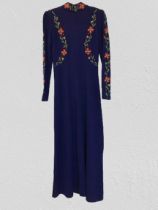 Long vintage dress with embordered flower down sleeves chest and neck