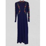 Long vintage dress with embordered flower down sleeves chest and neck