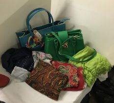 A collection of scarves (x5) and handbags (x2)