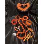 A selection of costume jewellery in browns and oranges