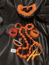 A selection of costume jewellery in browns and oranges