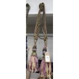 A pair of curtain tie backs in lilac & gold with gems and beading with tassel