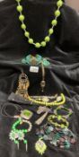A quantity of Lime, Jade and emerald green costume jewellery