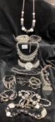 A collection of black and silver costume jewellery