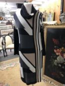 A long tunic dress lined with geometric design. Cowl neck, Size 12