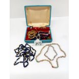 A mixed lot of costume jewellery including necklaces & pendants etc.