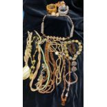 A selection of costume jewellery including Agate, wood, beads etc