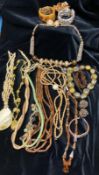 A selection of costume jewellery including Agate, wood, beads etc