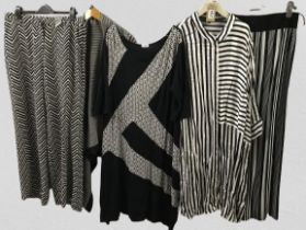Five assorted black & white ladies clothing approx. size 18