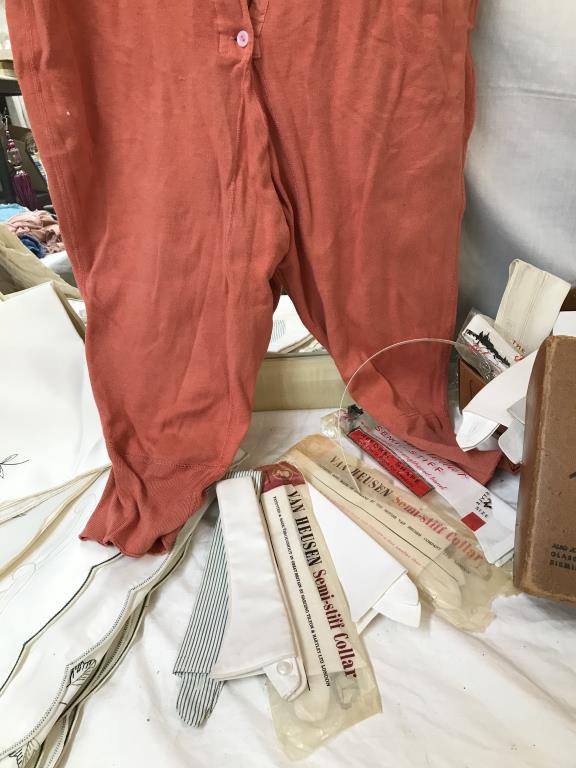 A box of original starched wing collars in various sizes and a dyed orange button up vintage thermal - Image 7 of 7