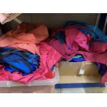A quantity of saree items in two large boxes