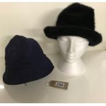 Two cloche hats in shades of blue and black,