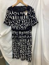 A short sleeve day dress new with tags. Designer betty Barclay size 10