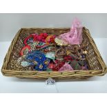 A basket of assorted costume jewellery