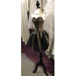 A Black and leopard pint mannequin with embellishments