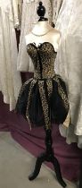 A Black and leopard pint mannequin with embellishments