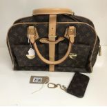 Beautiful handbag with monogram and matching purse