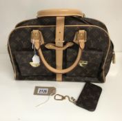 Beautiful handbag with monogram and matching purse