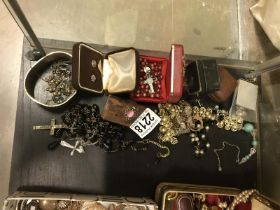 A mixed box of costume jewellery and ring boxes etc