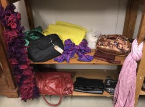 A collection of scarves and bags