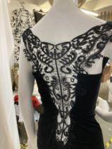 A Karen Mullen black evening top with lace panel, cowl neckline, size 8